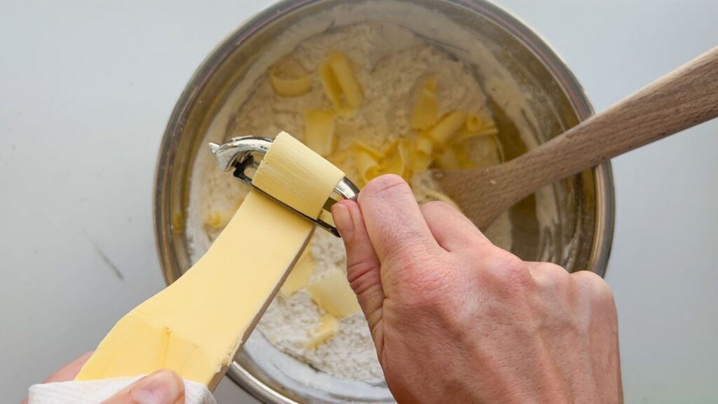 Shaving butter with a vegetable peeler